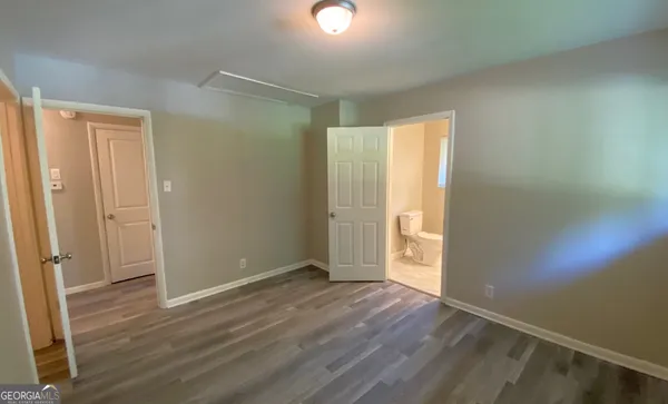 a bathroom with a sink a toilet and bathtub