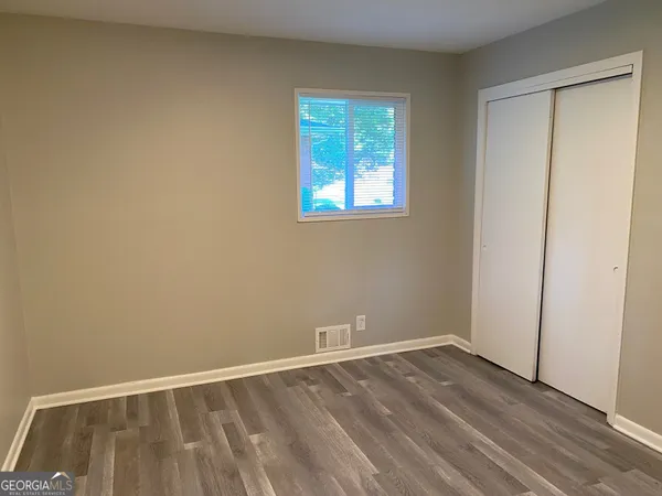 a view of an empty room and window