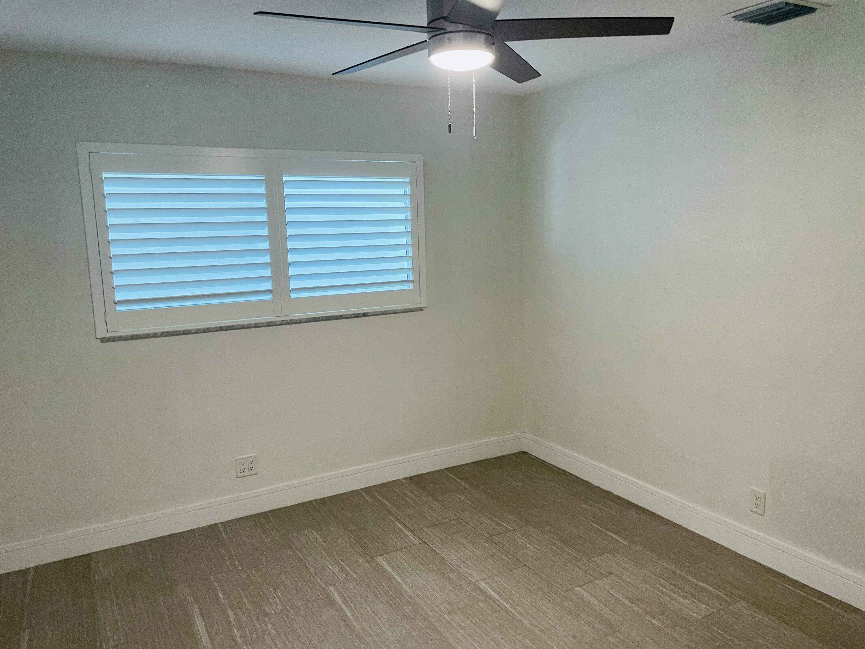 2100 Northeast 38th Street, Unit 142 Lighthouse Point, FL 33064 - Photo 22 of 42 Main Bedroom