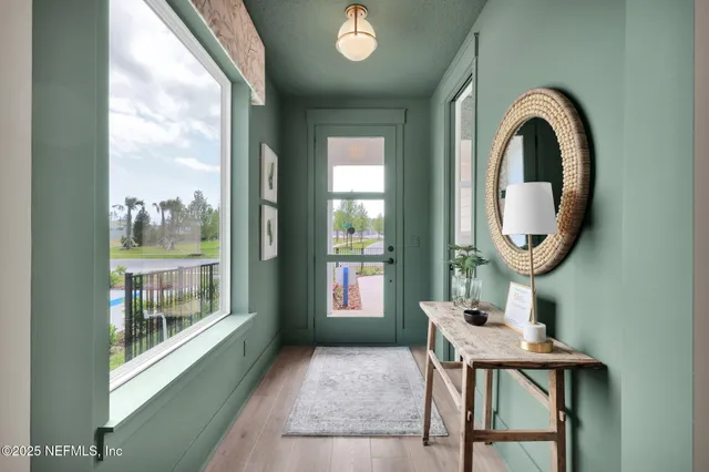 a kitchen with stainless steel appliances granite countertop a stove and a refrigerator