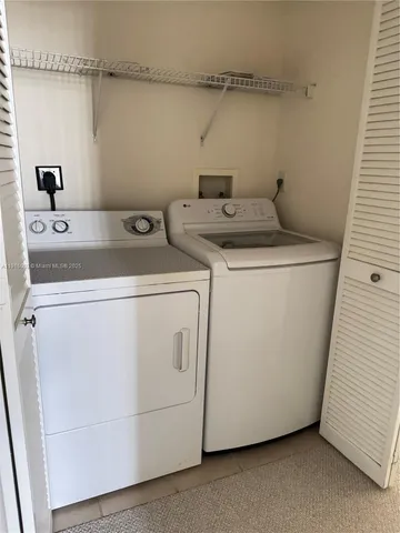 a view of a building with sitting area