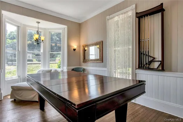 a view of kitchen island with stainless steel appliances window