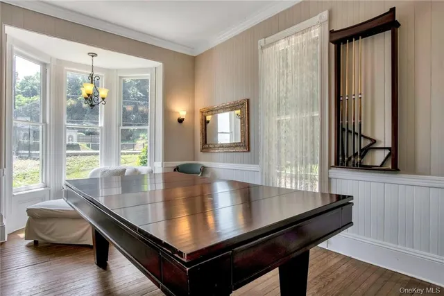 a view of kitchen island with stainless steel appliances window