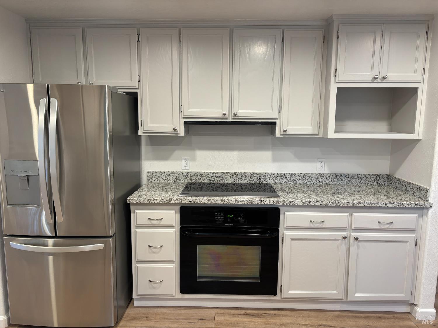 1776 Meda Avenue Santa Rosa, CA 95404 - Photo 12 of 28 a kitchen with cabinets stainless steel appliances and a counter space