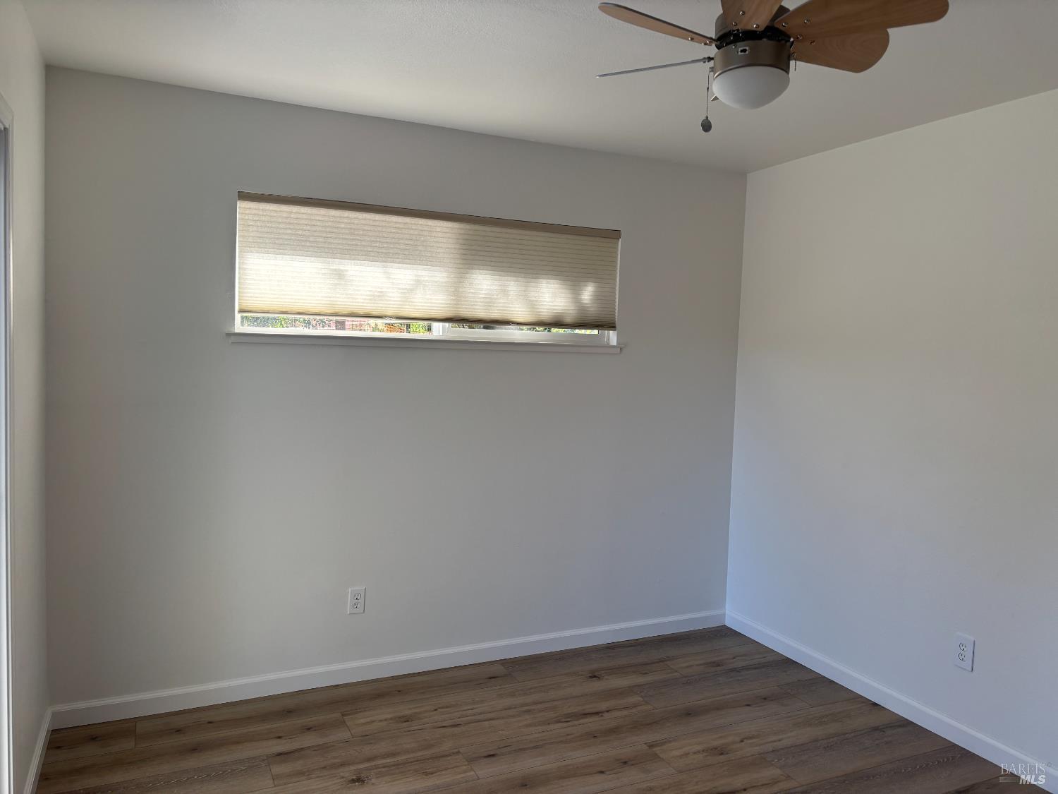 1776 Meda Avenue Santa Rosa, CA 95404 - Photo 16 of 28 a view of a room with wooden floor and fan