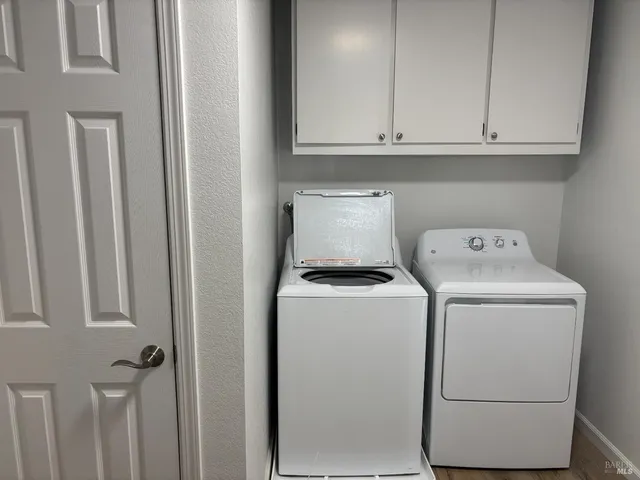 a view of a room with wooden walls