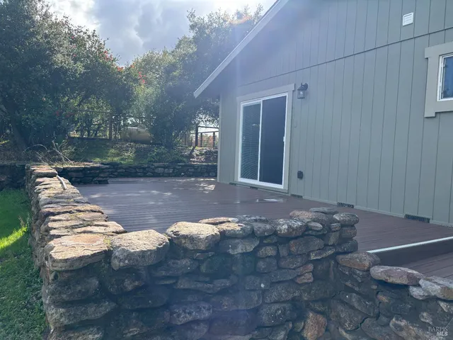 a view of a back yard of the house