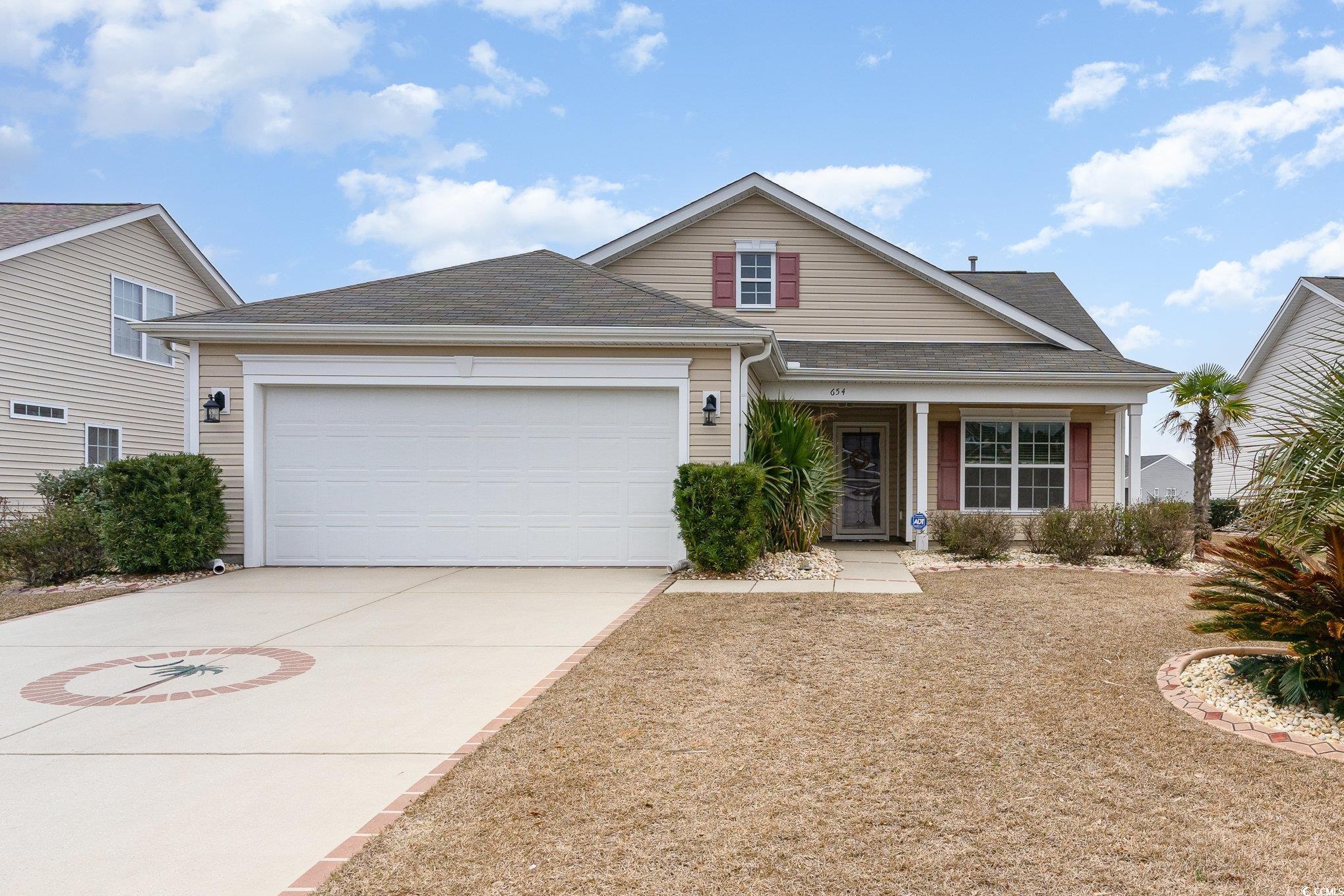 654 Old Castle Loop Myrtle Beach, SC 29579 - Photo 1 of 39 View of front of house featuring driveway, a shing