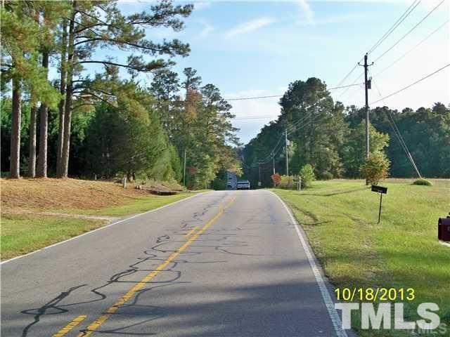 1625 Pearces Road Zebulon, NC 27597 - Photo 3 of 6 a view of a park with large trees