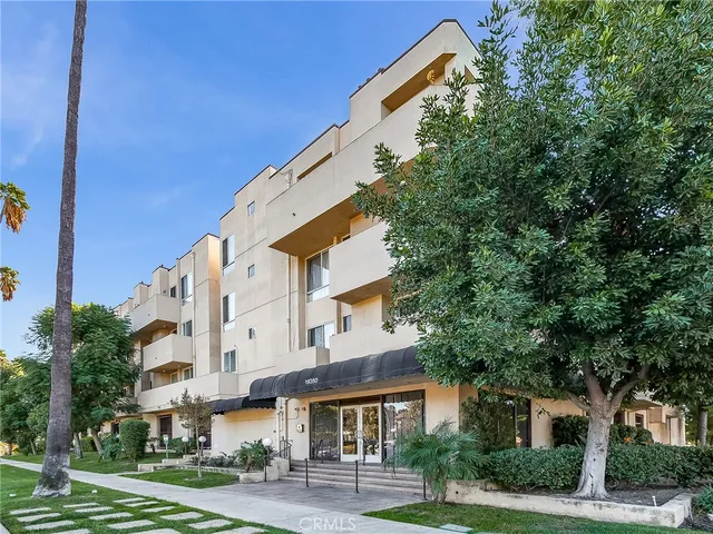 a view of a building with a street
