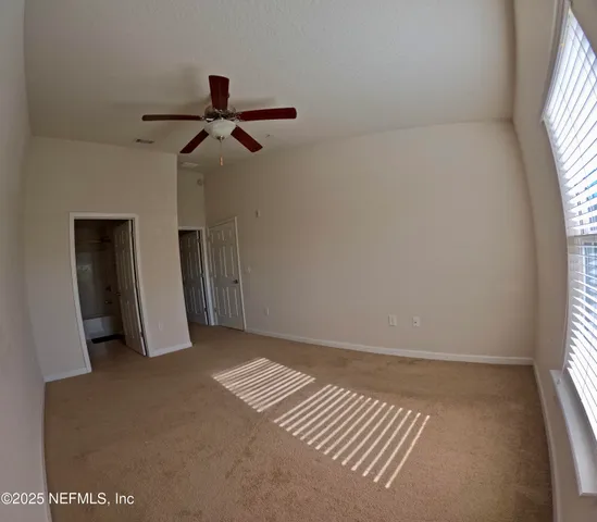 an empty room with windows