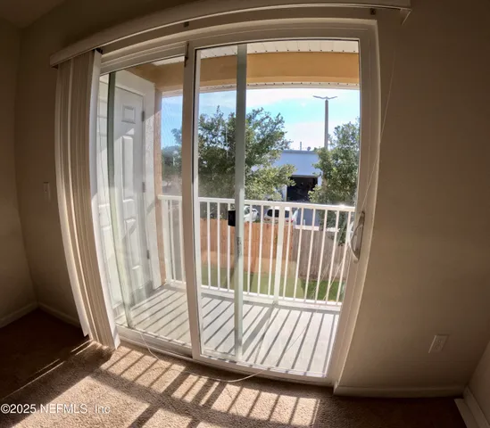 a view of a porch with a door