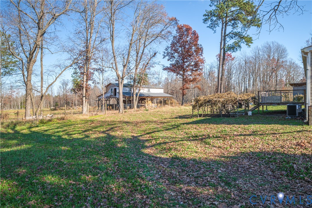 14306 Wilkinson Road Dewitt, VA 23840 - Photo 39 of 60 Expansive lawn area with scattered trees, offering