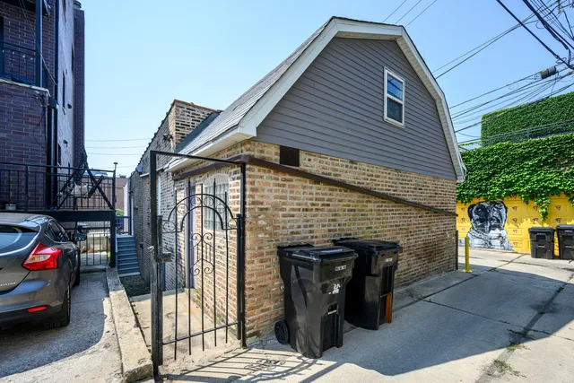 a front view of a house with parking area