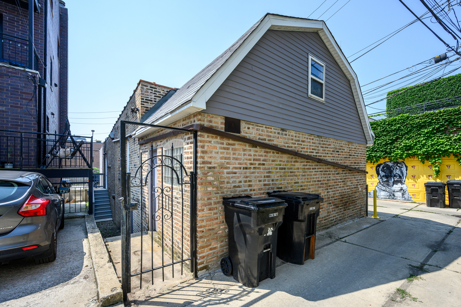 1646 West Blackhawk Street Chicago, IL 60622 - Photo 13 of 21 a front view of a house with parking area