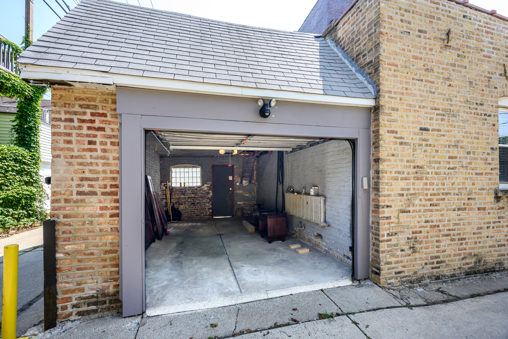 1646 West Blackhawk Street Chicago, IL 60622 - Photo 14 of 21 a view of a brick house with a large window