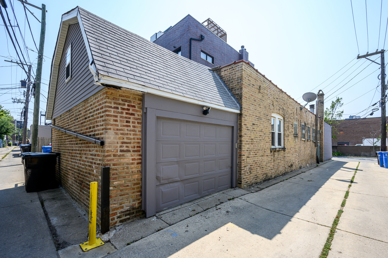 1646 West Blackhawk Street Chicago, IL 60622 - Photo 15 of 21 a front view of a house with a garage