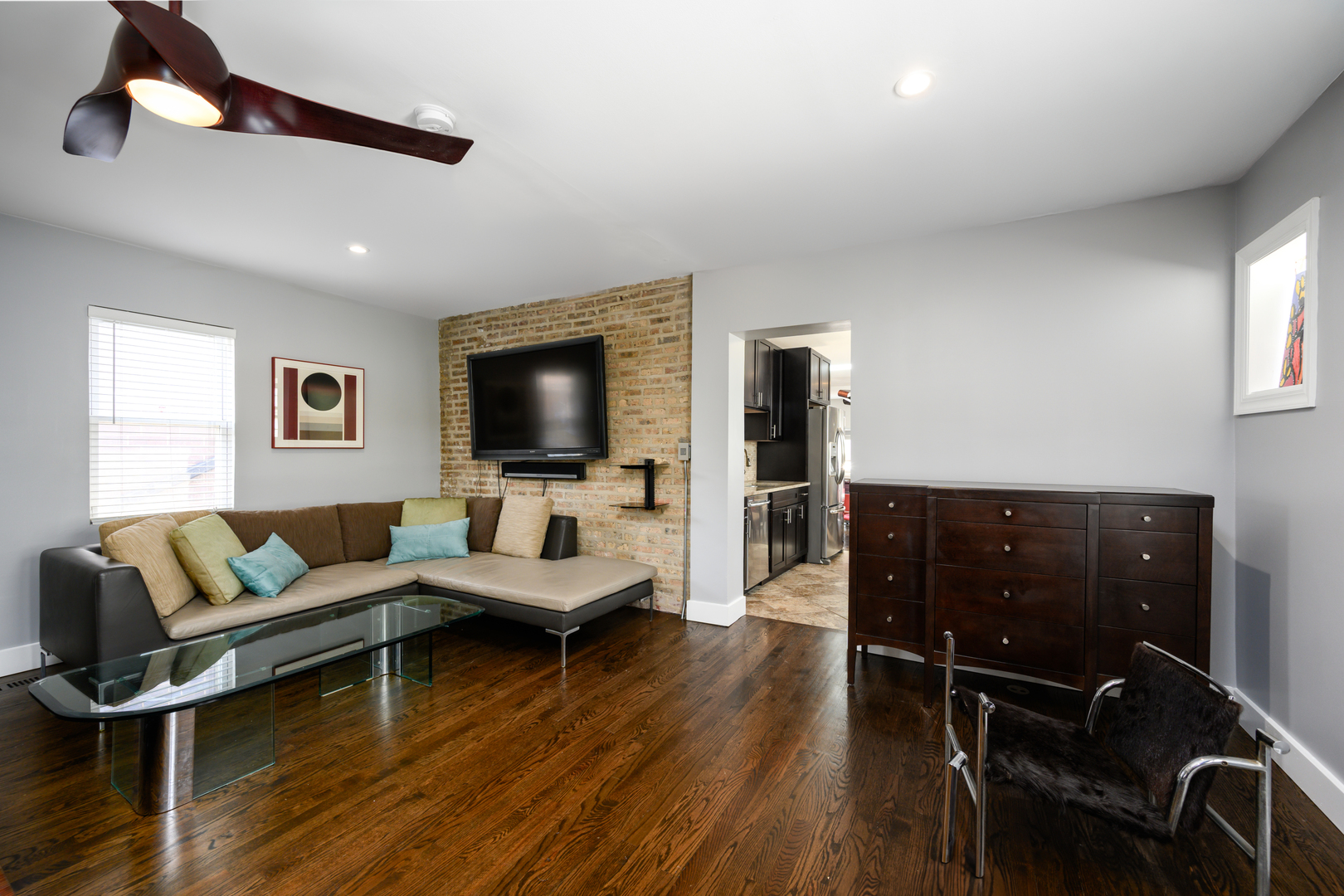 1646 West Blackhawk Street Chicago, IL 60622 - Photo 9 of 21 a living room with furniture and a flat screen tv