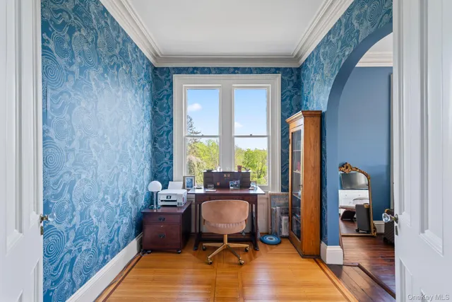 a living room with furniture and a window