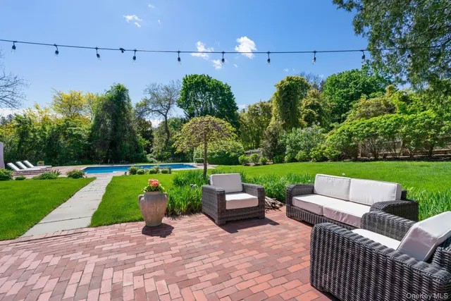 a view of yard with patio