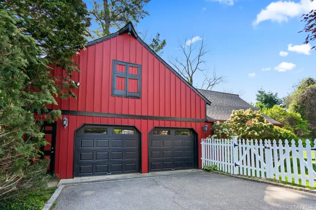a view of a house with a garage