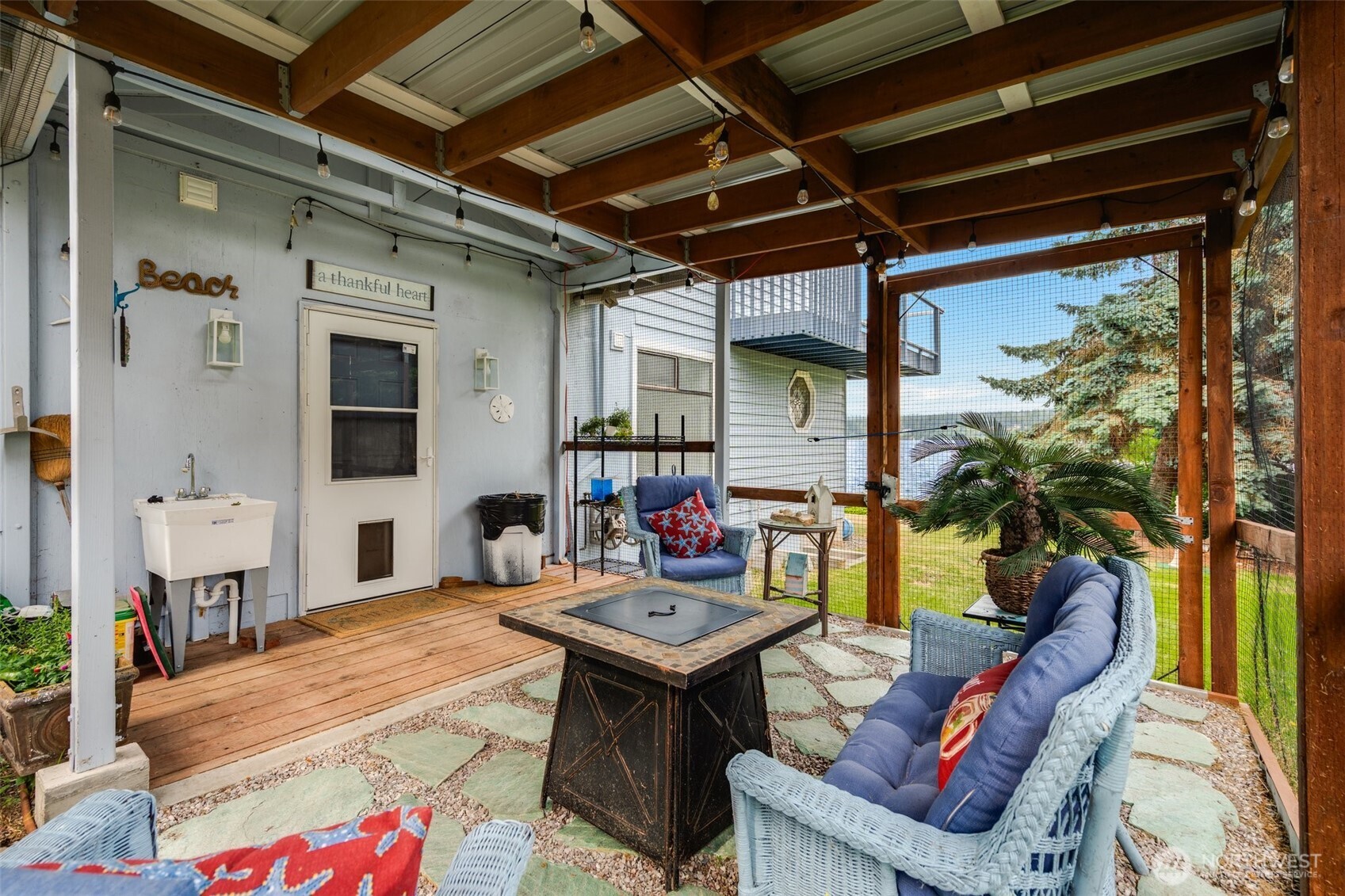 5341 South Bercot Road Freeland, WA 98249 - Photo 29 of 37 a view of an outdoor space with seating