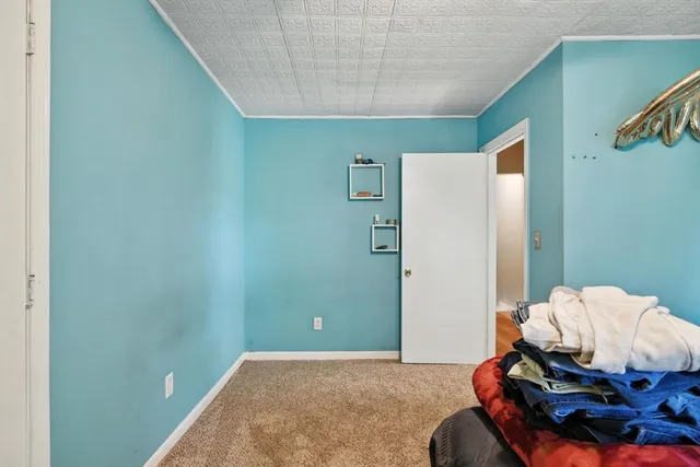 a room with furniture and a window