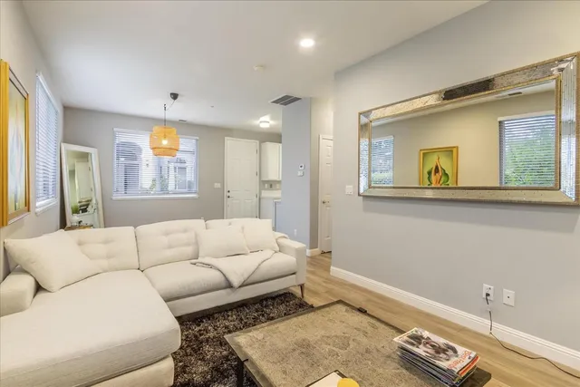 a living room with furniture and a couch