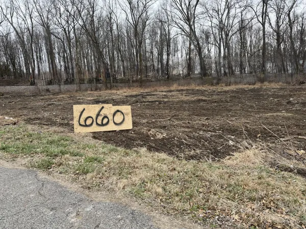 a view of outdoor space with sign board