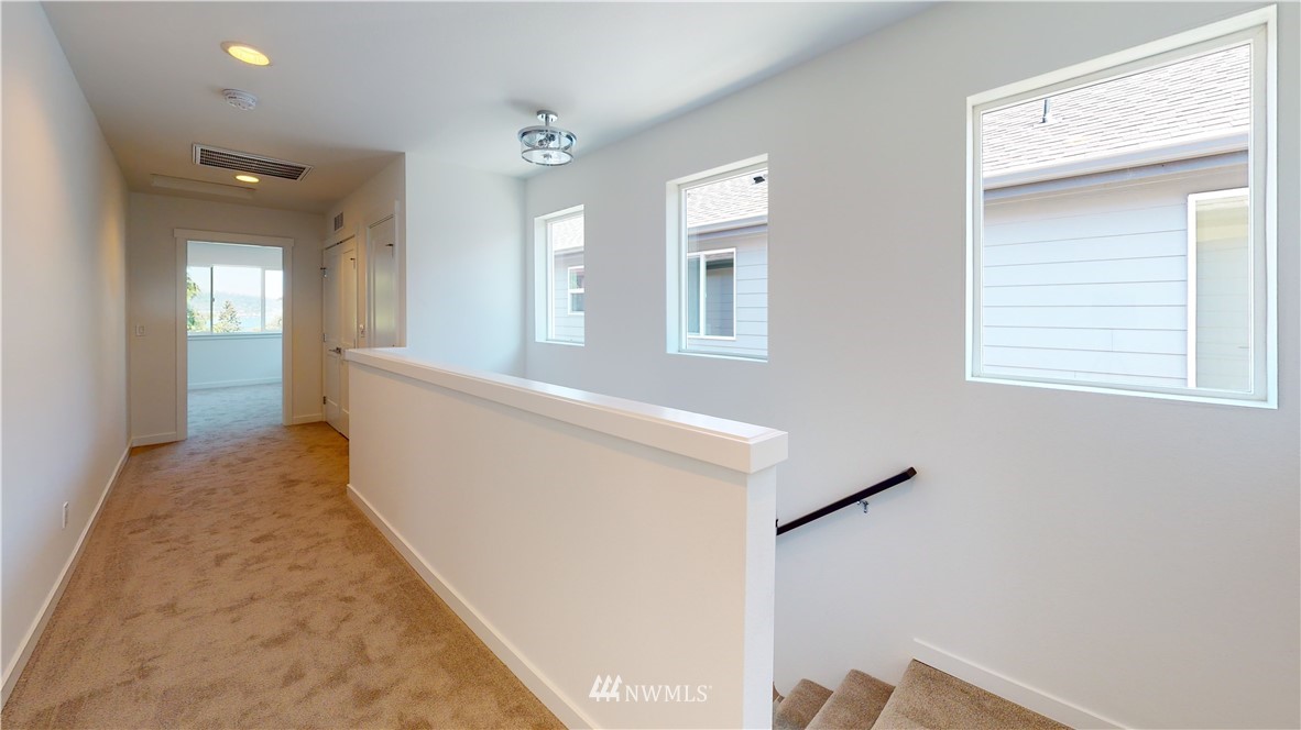 320 South 48th Street, Unit H19 Renton, WA 98055 - Photo 28 of 29 a view of hallway with windows