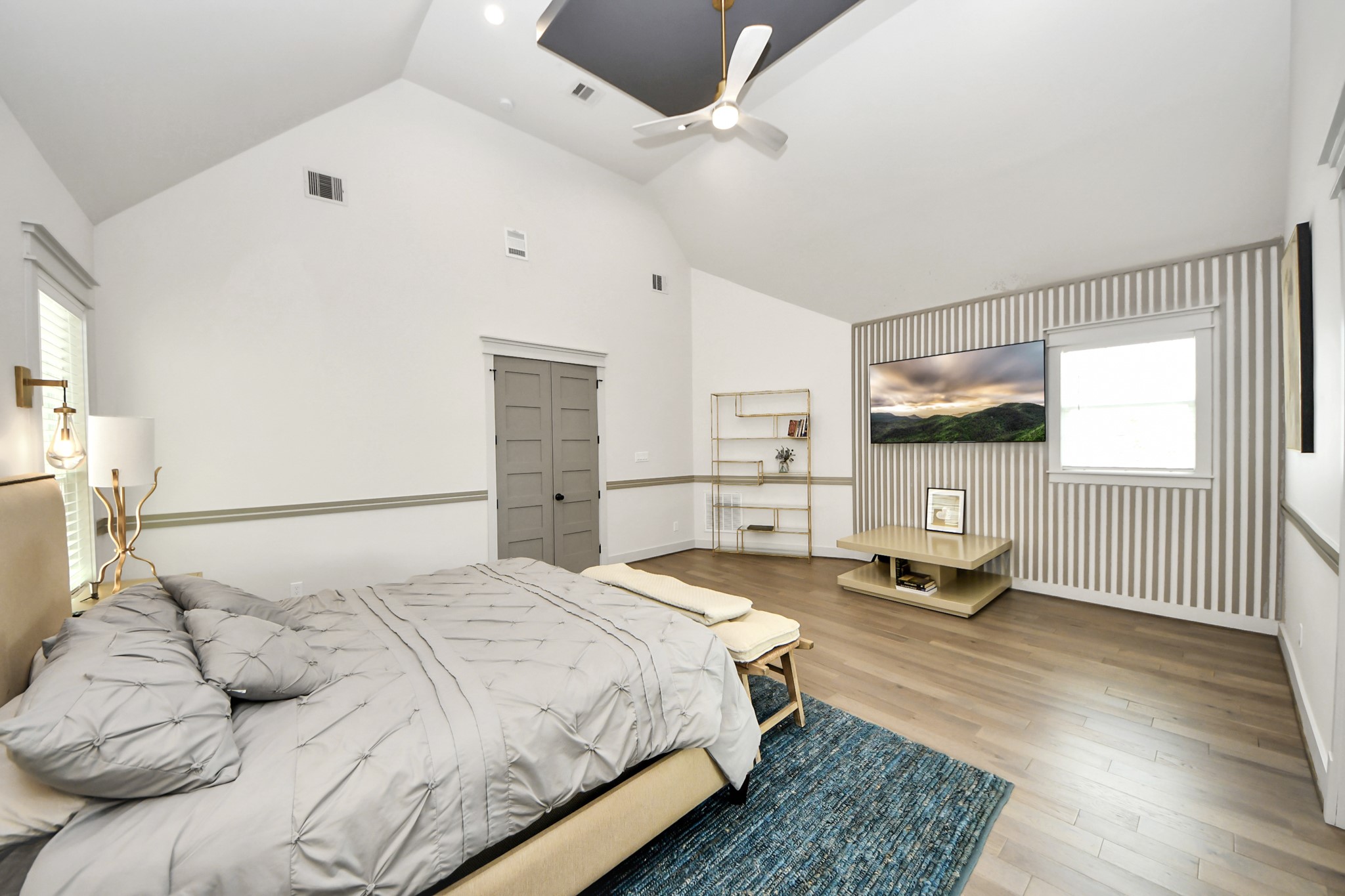 3520 Beauchamp Street Houston, TX 77009 - Photo 37 of 50 a bedroom with a bed and a chandelier