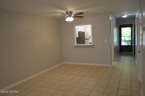 a kitchen with a sink stove and refrigerator