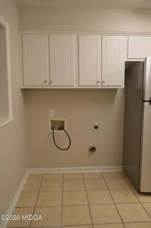 an empty room with wooden floor