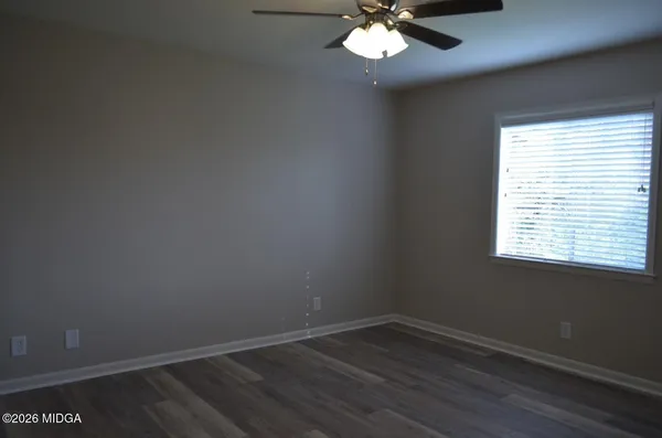 a bathroom with a sink a toilet and a bathtub