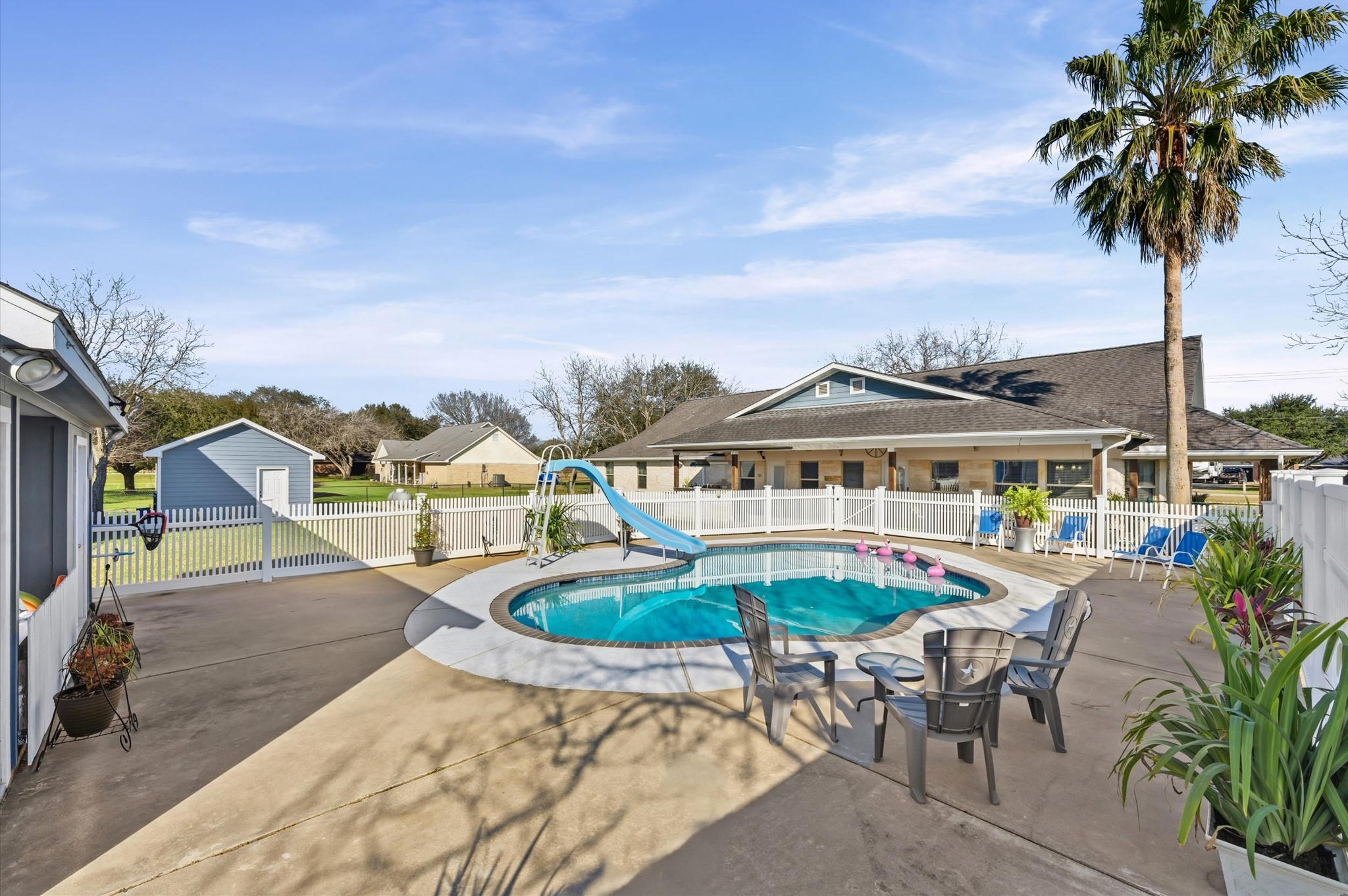 1840 Caroline Street Dickinson, TX 77539 - Photo 34 of 45 Pool area offers plenty of seating areas and an outdoor pool bathroom and well house storage area