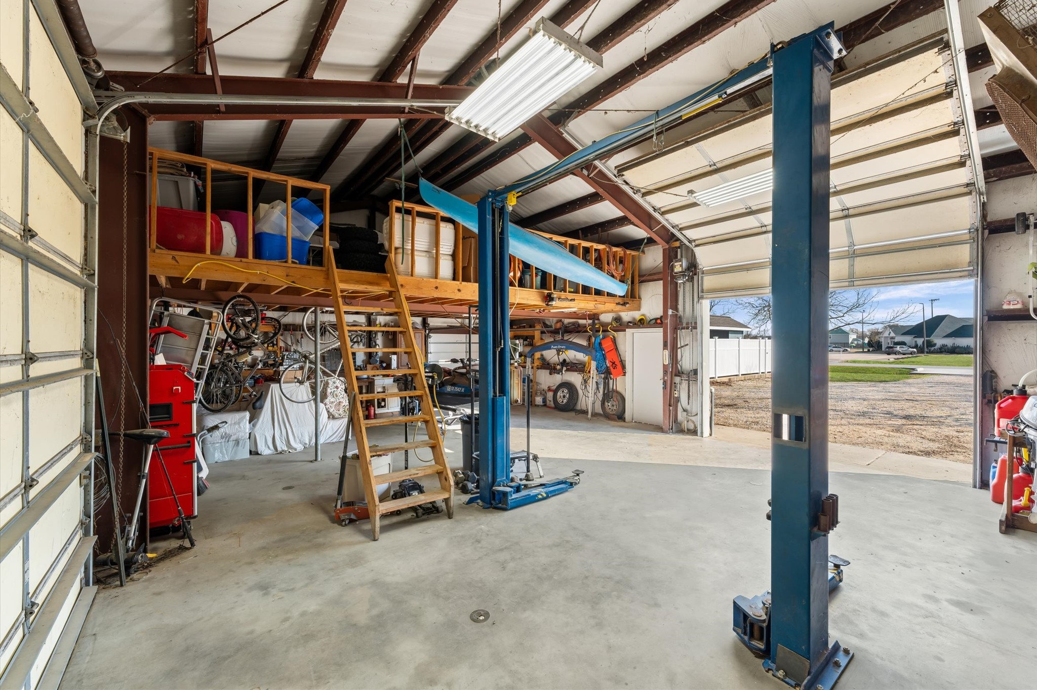 1840 Caroline Street Dickinson, TX 77539 - Photo 39 of 45 Shop includes a car lift and you could park up to 5 cars