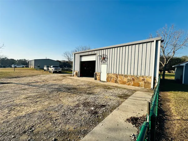 a view of swimming pool with a yard