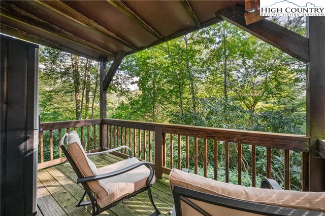 a view of a two chair in the balcony