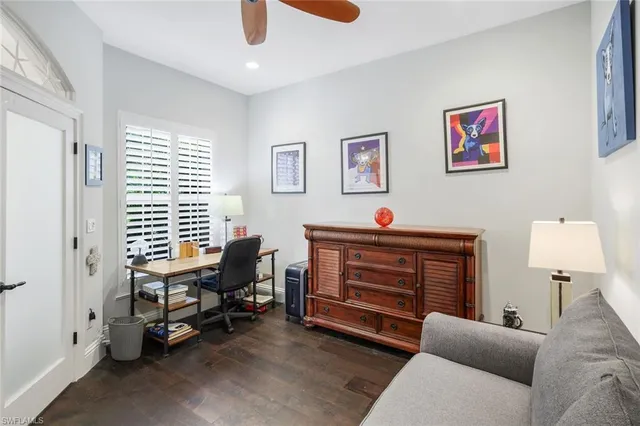 a bed room with furniture and a window