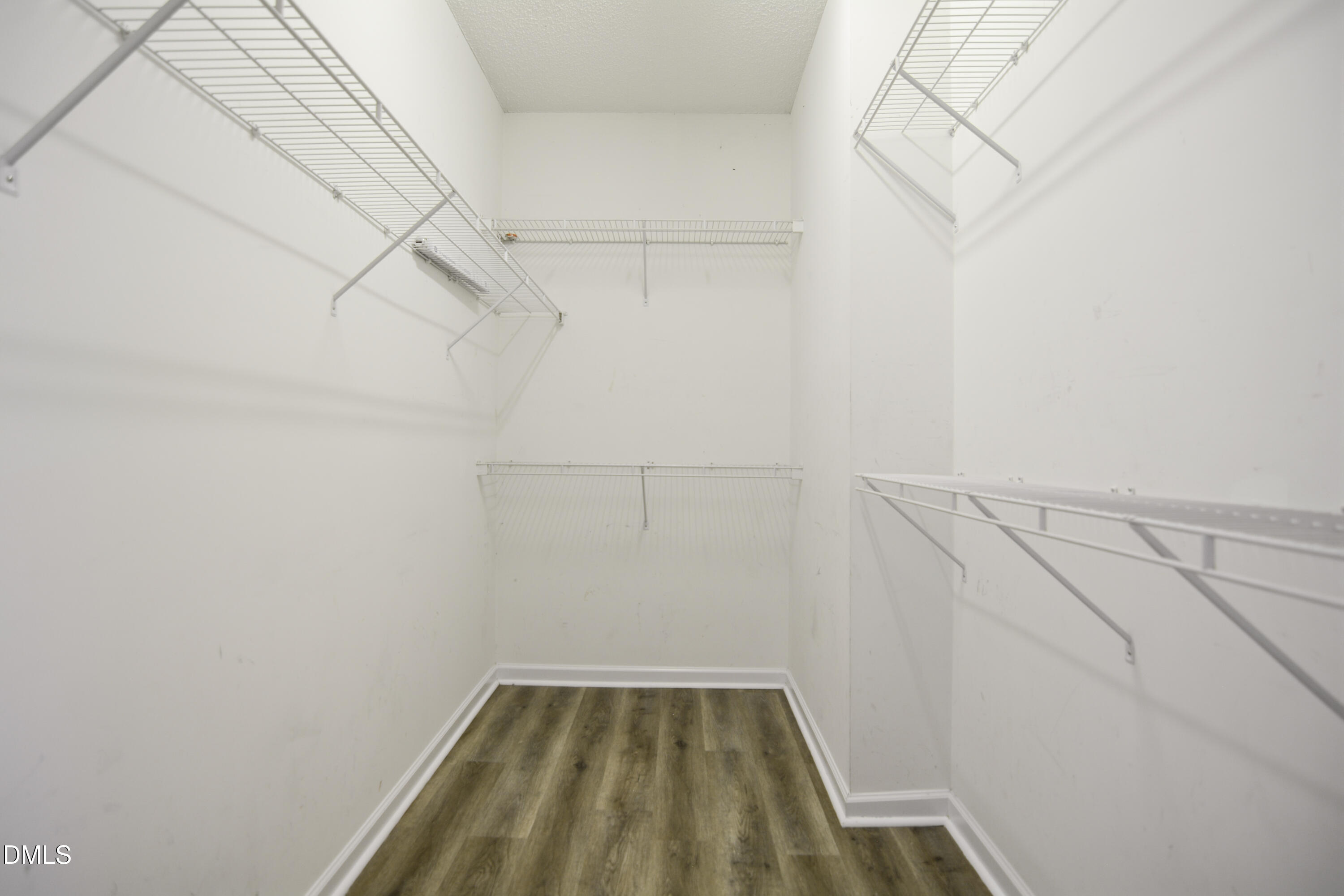 4801 Topstone Road Raleigh, NC 27603 - Photo 13 of 29 a view of a room with racks on the wall
