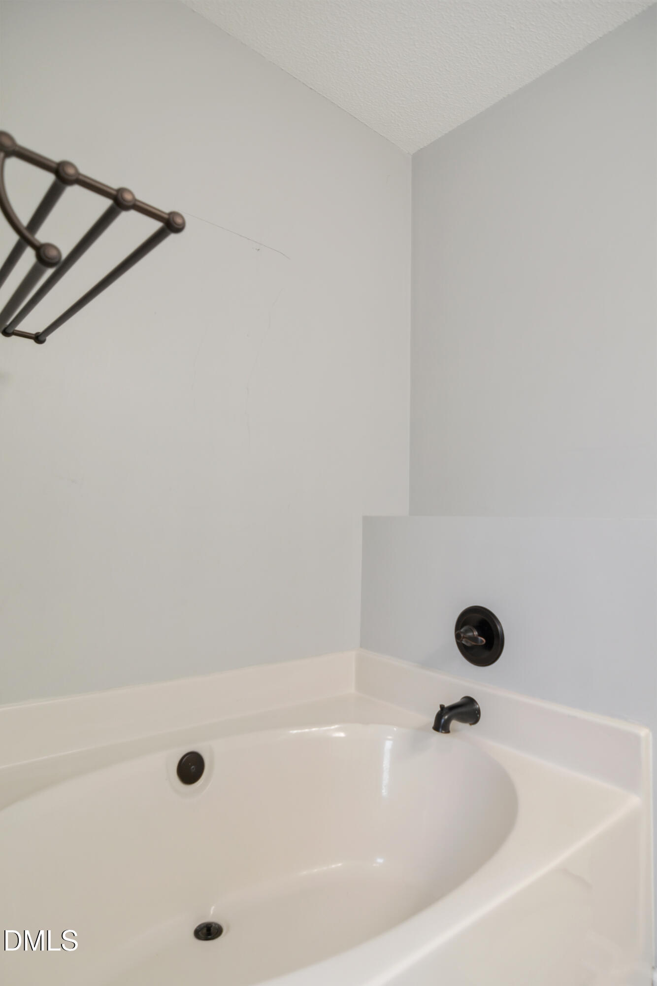 4801 Topstone Road Raleigh, NC 27603 - Photo 17 of 29 a bathroom with a tub