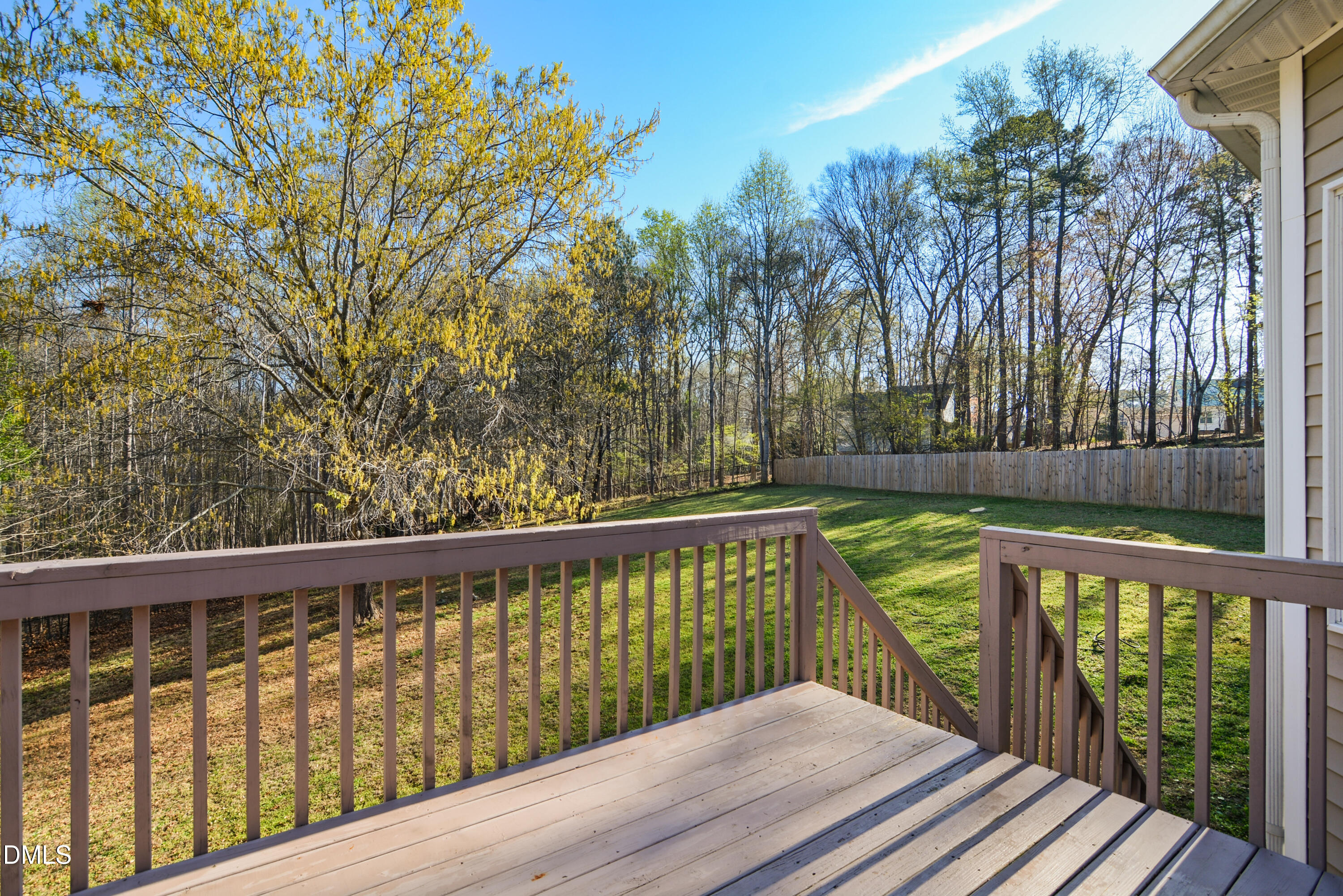 4801 Topstone Road Raleigh, NC 27603 - Photo 27 of 29 a balcony with wooden floor and fence