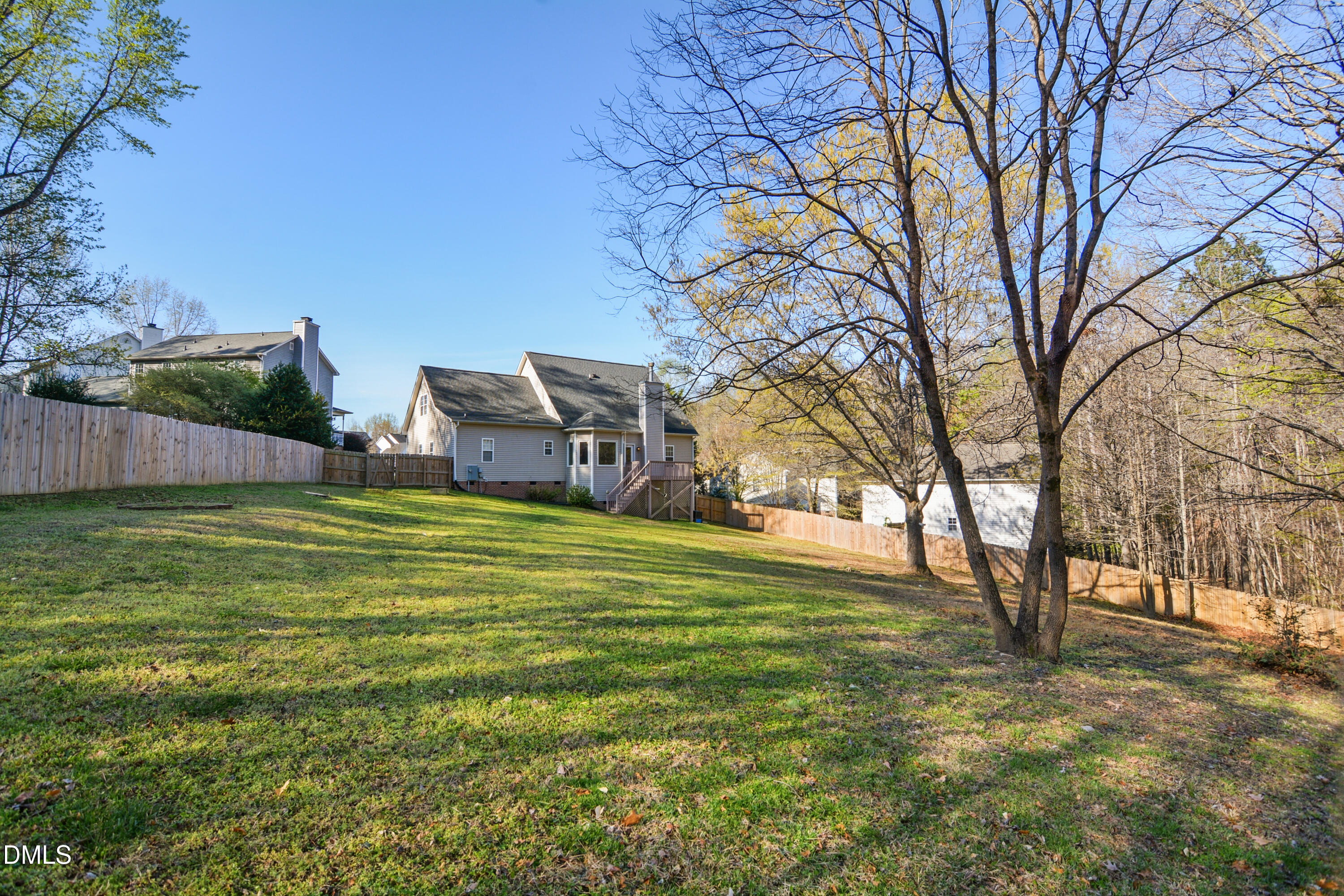 4801 Topstone Road Raleigh, NC 27603 - Photo 29 of 29 a view of a house with a yard