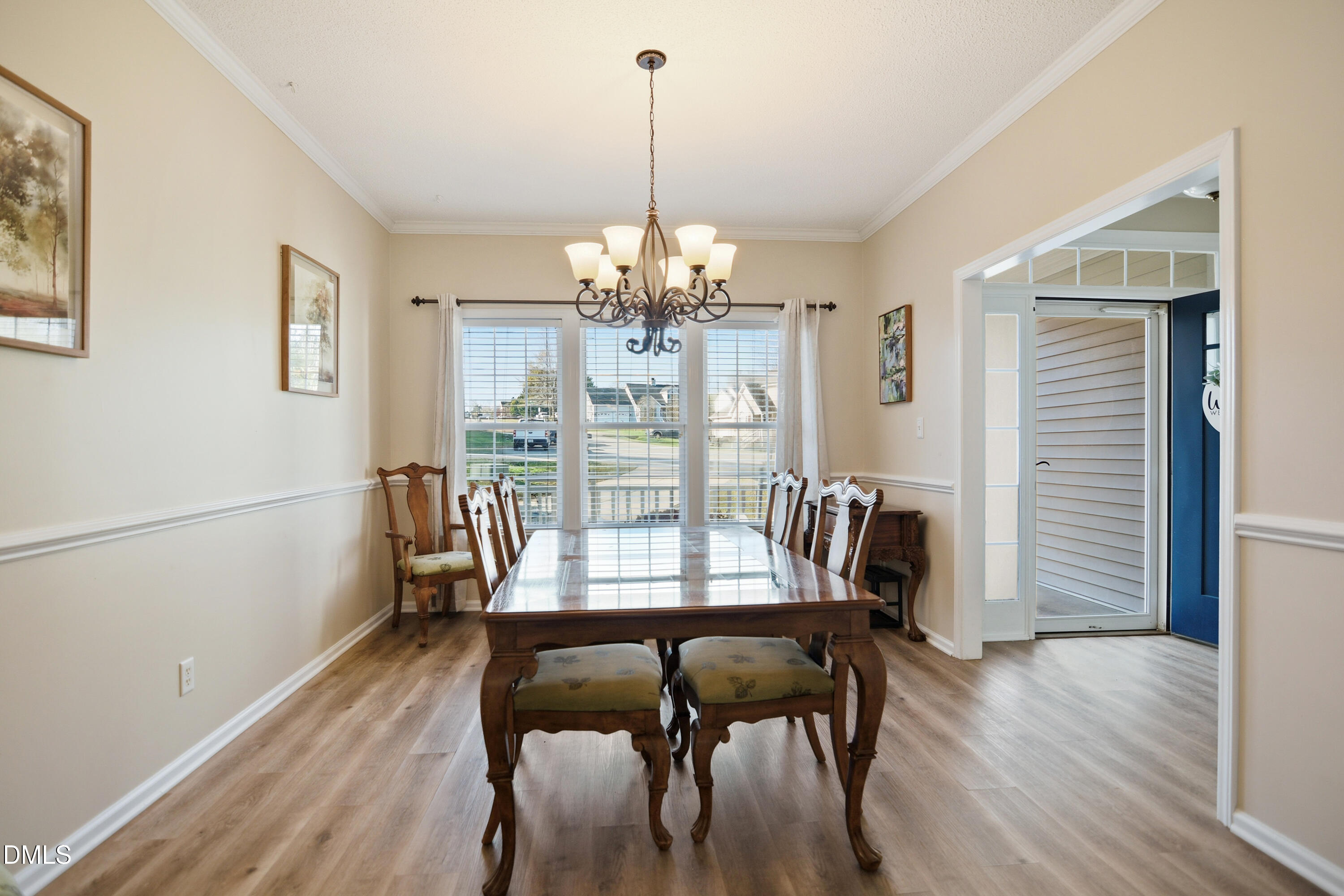 4801 Topstone Road Raleigh, NC 27603 - Photo 7 of 29 a dining room with furniture and window