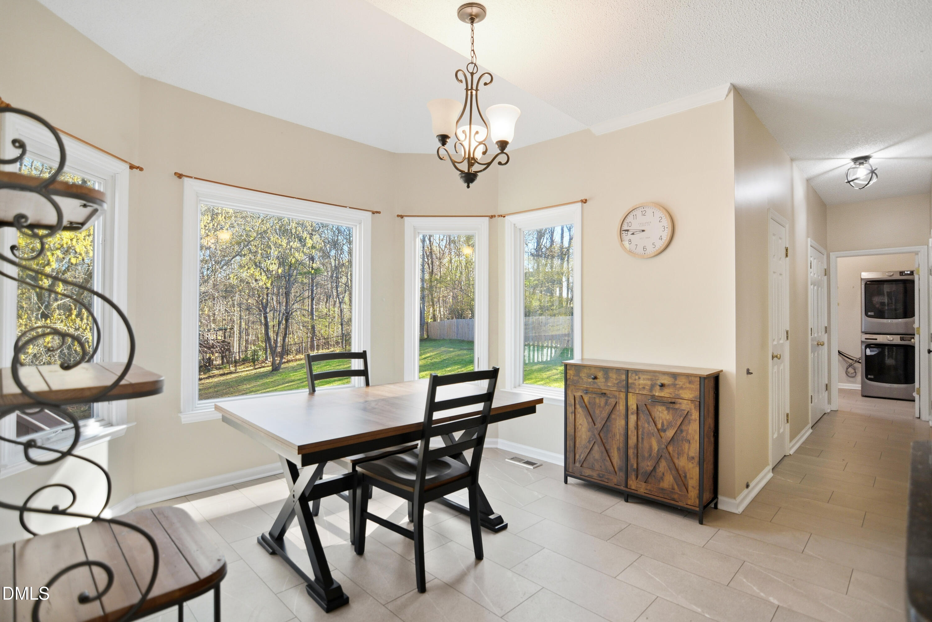 4801 Topstone Road Raleigh, NC 27603 - Photo 10 of 29 a view of a dining room with furniture window and outside view