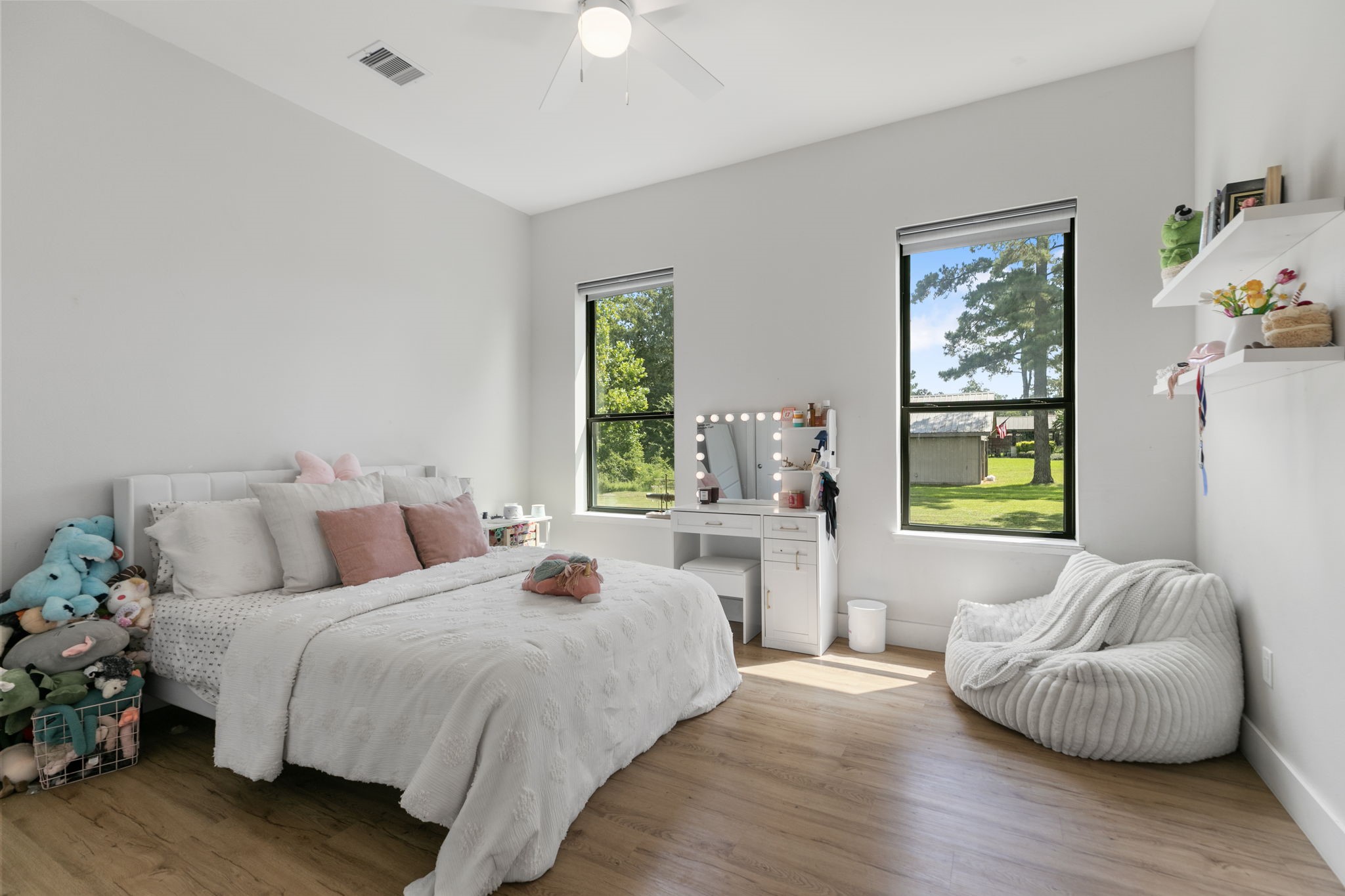 1400 Hicks Street Tomball, TX 77375 - Photo 29 of 45 a bedroom with a bed and a window