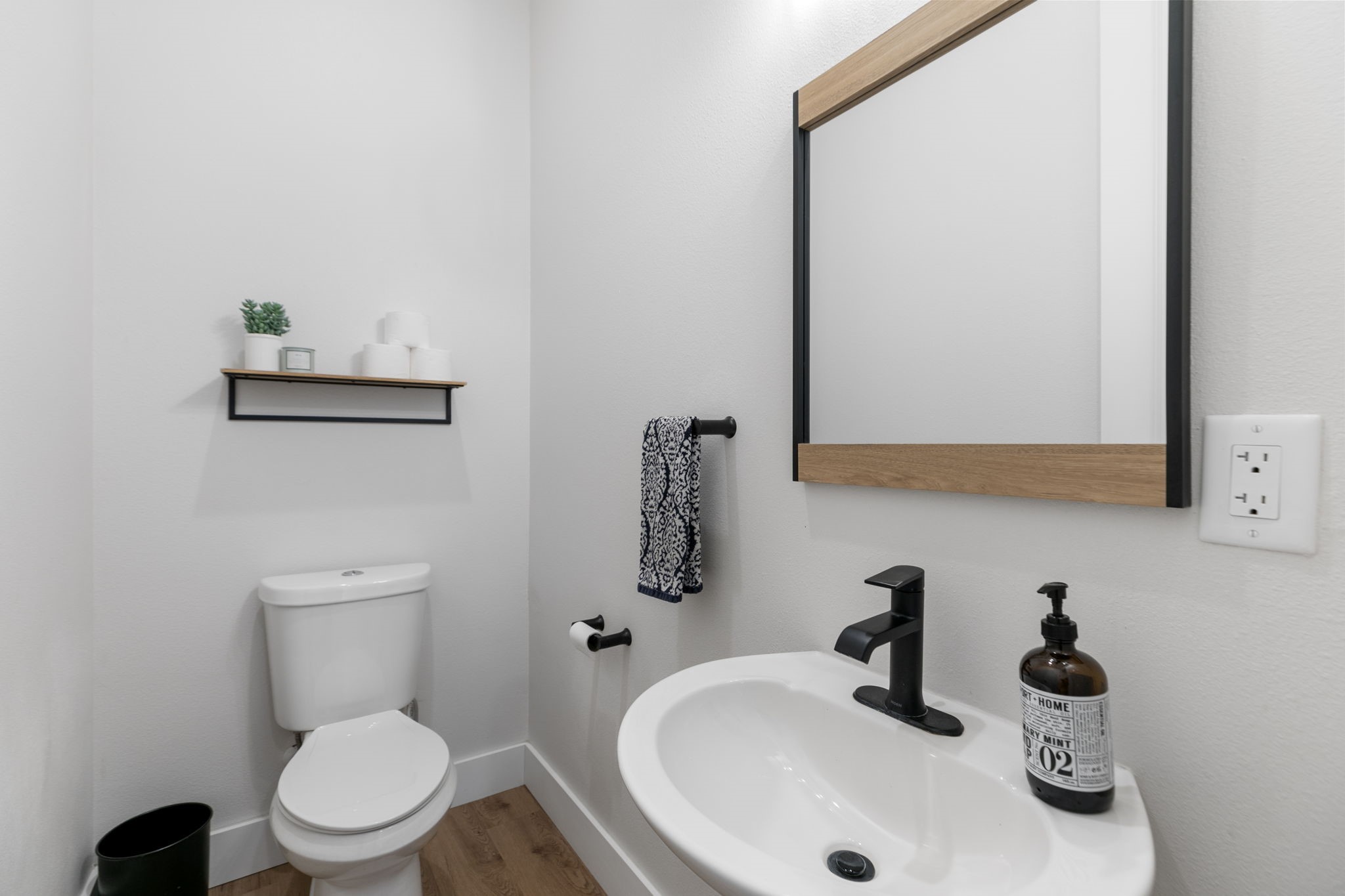 1400 Hicks Street Tomball, TX 77375 - Photo 35 of 45 a bathroom with a toilet sink and mirror