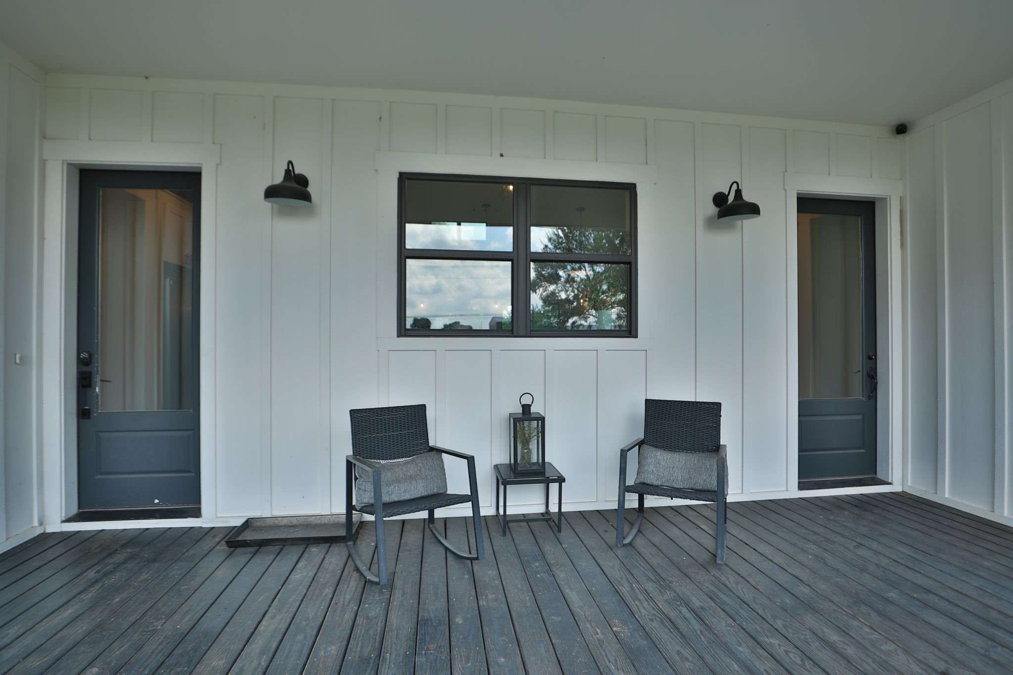 1400 Hicks Street Tomball, TX 77375 - Photo 5 of 45 a view of a livingroom with wooden floor and a floor to ceiling window