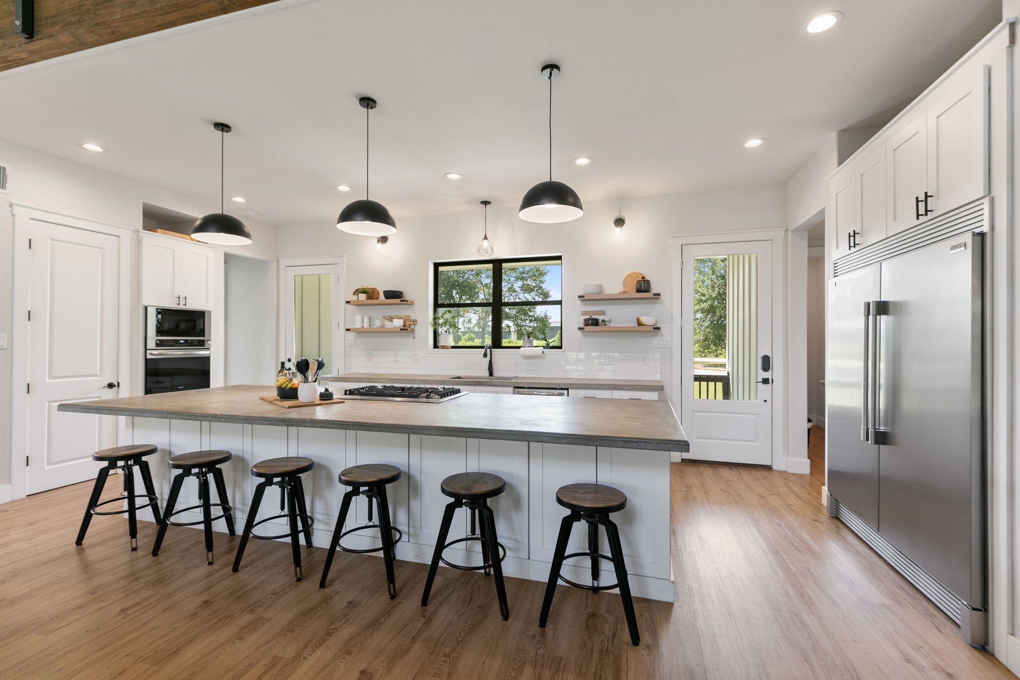1400 Hicks Street Tomball, TX 77375 - Photo 8 of 45 a large kitchen with a table and chairs