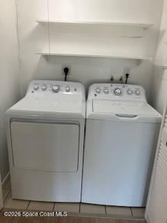 153 Augusta Way Melbourne, FL 32940 - Photo 26 of 38 a utility room with dryer and washer